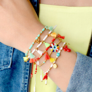 Set di ispirazione Realizzare coloratissimi braccialetti e cavigliere estive con le mini nappine