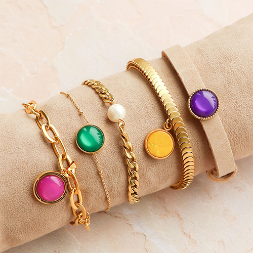 Bracciali e orecchini coordinati con cabochon