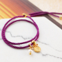 Crea facilmente braccialetti con ciondoli con cordoncino alla moda