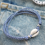 Ecco come creare bracciali alla moda con il cordoncino tubolare intrecciato: