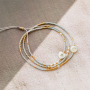 Idee creative per bracciali con perline di vetro a rondella