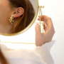 Come presentare orecchini e bracciali in acciaio inossidabile