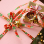 Crea braccialetti e regali festivi con il nastro BY31&reg; e campanellini